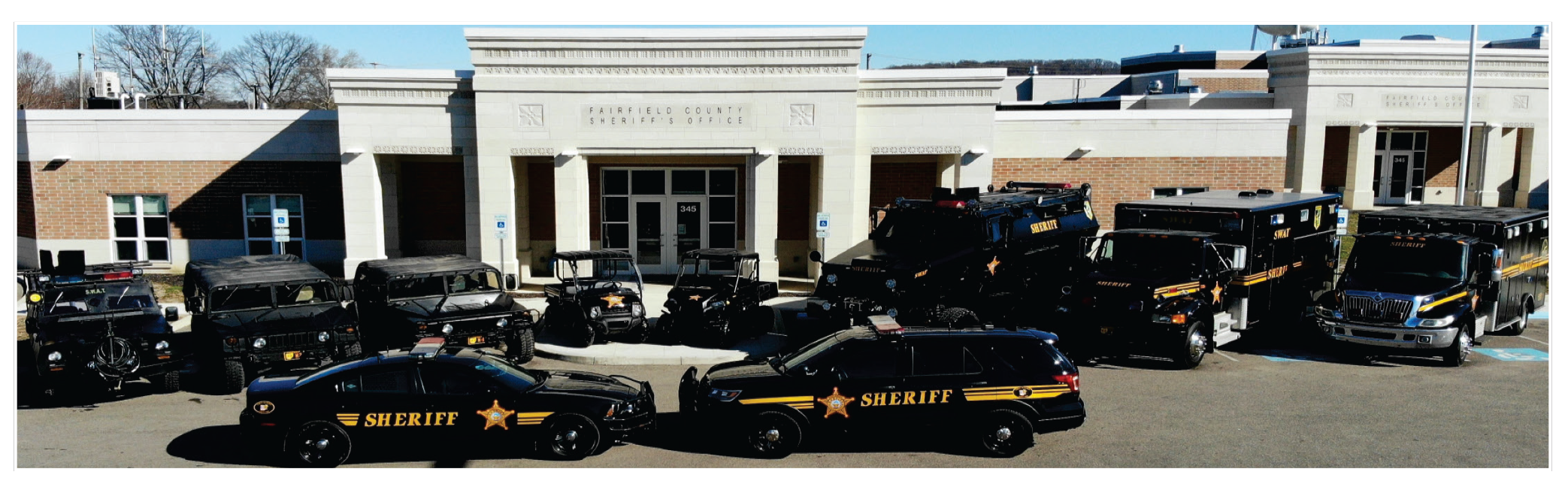 sheriff office cruisers outside office
